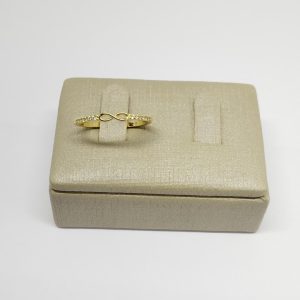 ANEL INFINITO LISO VAZ. C/ ZIRC NOS LADOS BANHO DOURADO