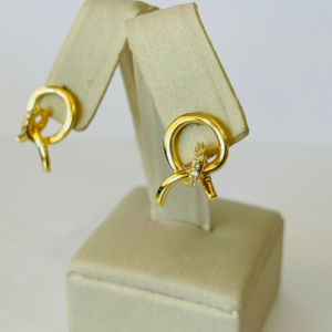 BRINCO LAÇADO CRAV. BANHO DOURADO