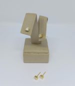 BRINCO ZIRC QUADRADA BANHO DOURADO