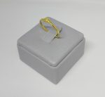 ANEL UMA ESTRELA CENTRAL COM ZIRC. BANHO DOURADO