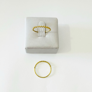 ANEL COM ESFERAS BRUTO