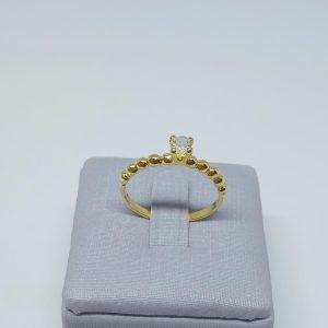 ANEL SOLITARIO COM ESFERAS BANHO DOURADO