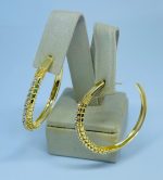 fora de linha ARGOLA TRANC. 15 PEDRAS BANHO DOURADO