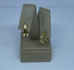 ARGOLA ESTAMPADA OVAL VAZ.FRIZADA BANHO DOURADO