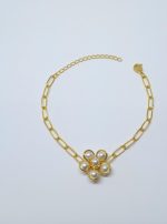 PULSEIRA FLOR PEROLA BANHO DOURADO