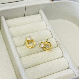 BRINCO VAZ. TRES GARRAS BANHO DOURADO