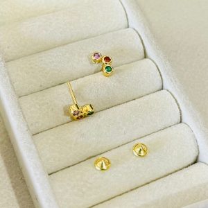 BRINCO BP TRES ZIRC. BANHO DOURADO