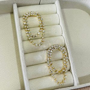 BRINCO DUAS CORR COM PEDRAS BANHO DOURADO