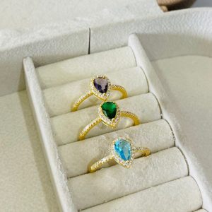 ANEL GOTA TRES GARRAS 671 CRAV. SM BANHO DOURADO