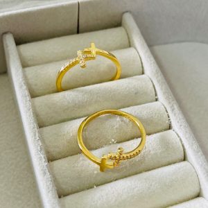 ANEL CRAV  DOIS CRUCIFIXOS BANHO DOURADO