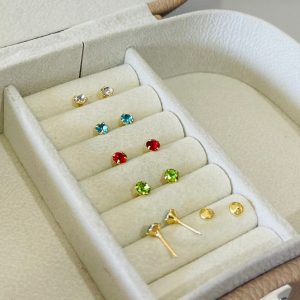 BRINCO BP  QUATRO GARRAS BANHO DOURADO