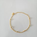 PULSEIRA CORR DE BOLA ELOS TRANCADOS BANHO DOURADO